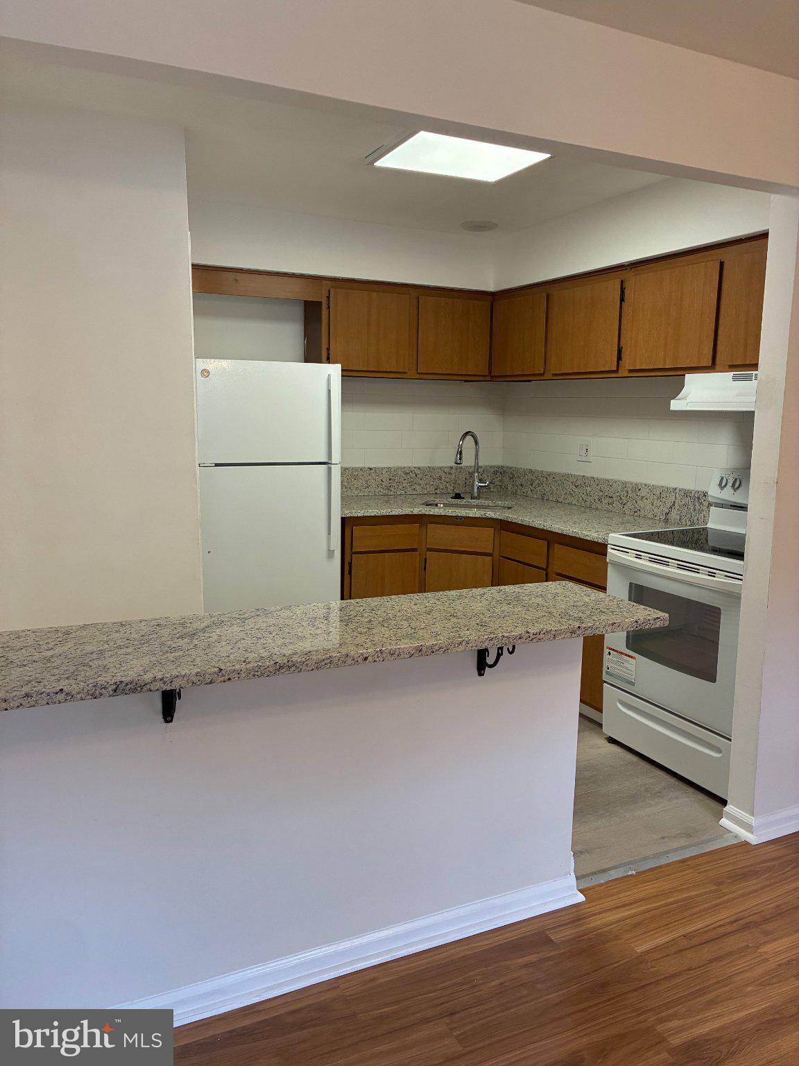 512 Stidman Drive, Unit D4 Springfield, PA 19064 - Photo 8 of 14 Modern kitchen with sleek finishes.