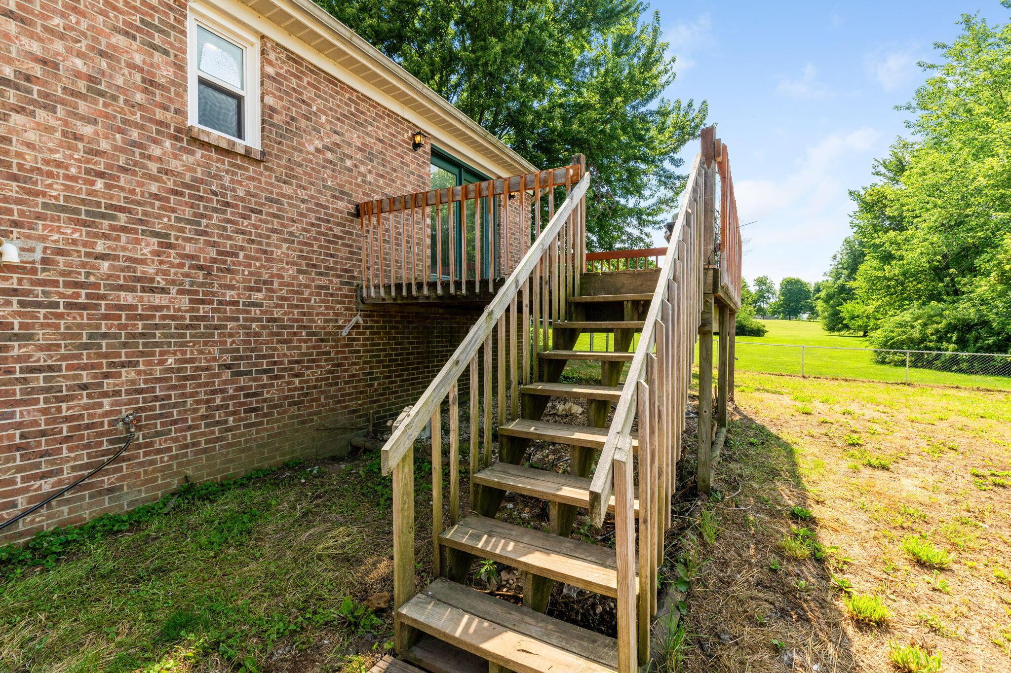 4120 Sintz Road Springfield, OH 45504 - Photo 48 of 64 Back deck and stairs down to yard,