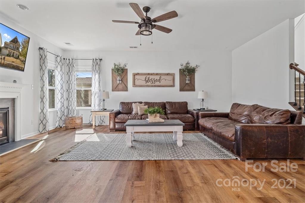 86646 Arrington Road Lancaster, SC 29720 - Photo 11 of 42 a living room with furniture and a fireplace
