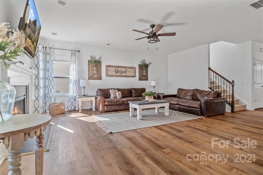 86646 Arrington Road Lancaster, SC 29720 - Photo 12 of 42 a living room with furniture and a wooden floor