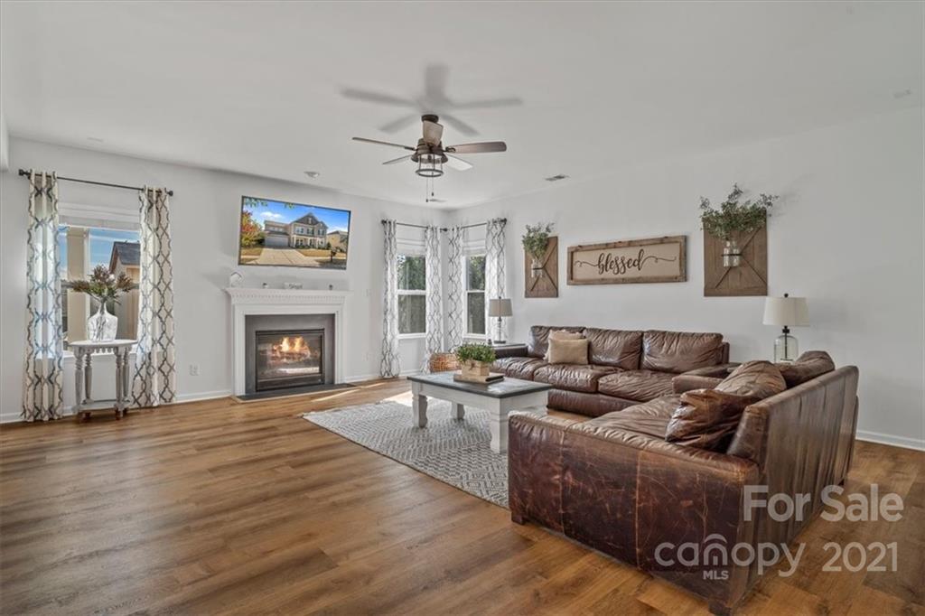 86646 Arrington Road Lancaster, SC 29720 - Photo 10 of 42 a living room with furniture and a fireplace