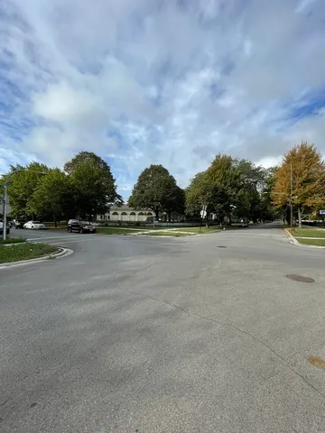 a view of swimming pool and mountain in the background