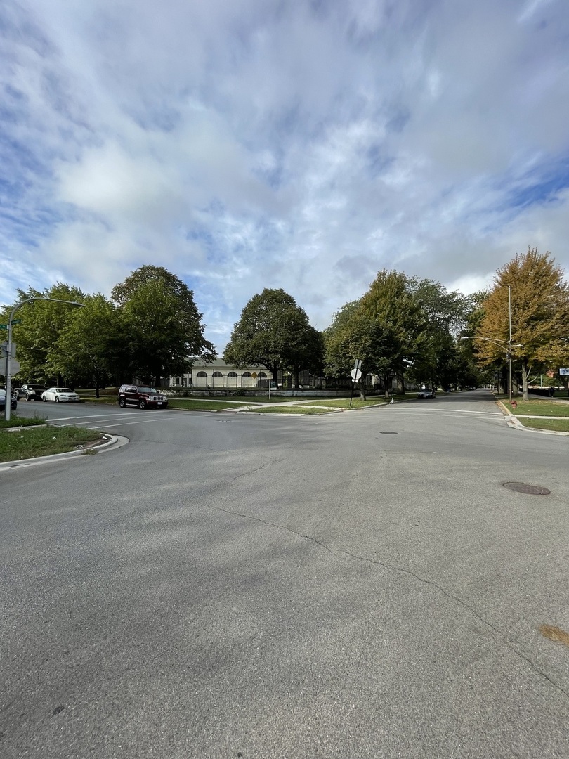 2841 East 89th Street Chicago, IL 60617 - Photo 8 of 8 a view of swimming pool and mountain in the background
