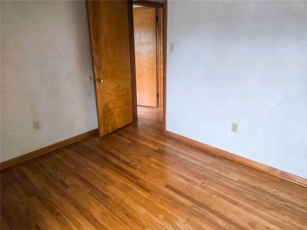 115 Mountain View Drive Armagh, PA 15920 - Photo 19 of 28 a view of an empty room with wooden floor and a window