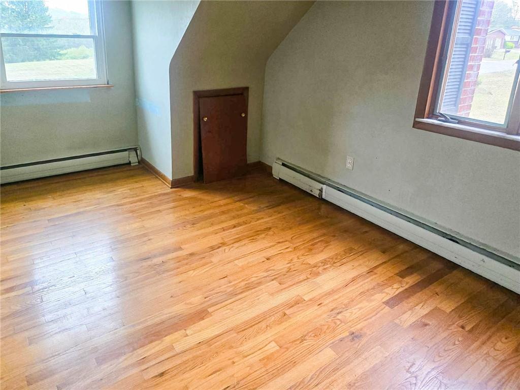 115 Mountain View Drive Armagh, PA 15920 - Photo 20 of 28 an empty room with wooden floor and windows