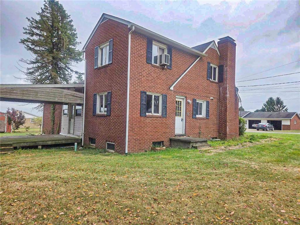 115 Mountain View Drive Armagh, PA 15920 - Photo 28 of 28 a front view of a house with garden