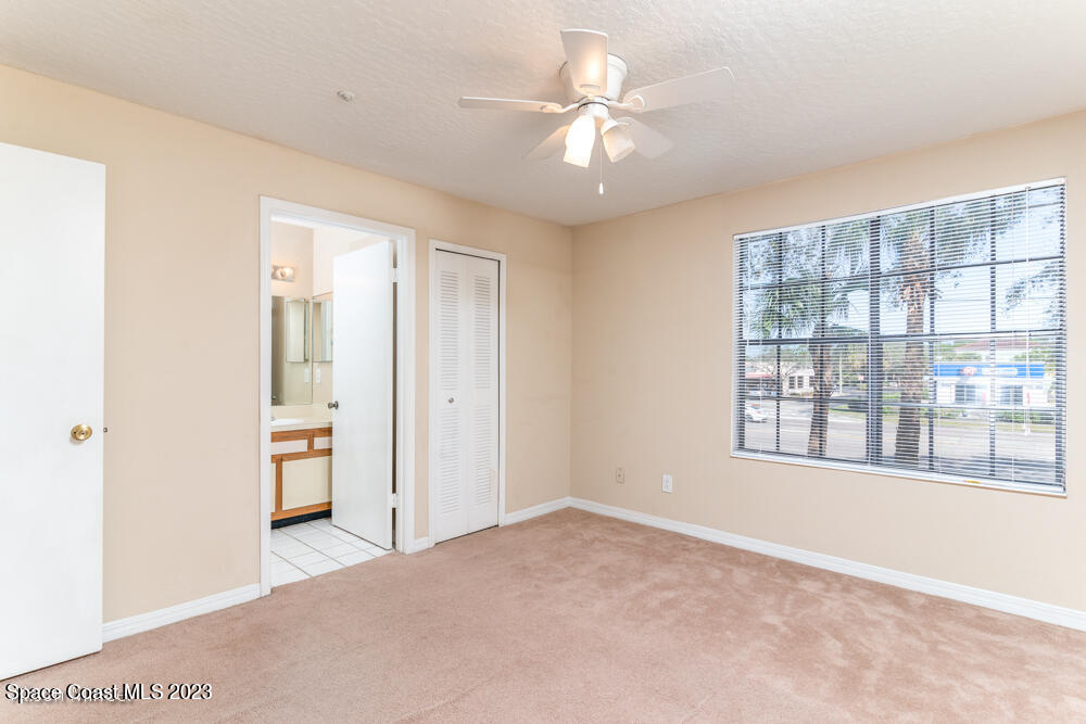 7667 North Wickham Road, Unit 312 Melbourne, FL 32940 - Photo 10 of 47 a view of an empty room with a window
