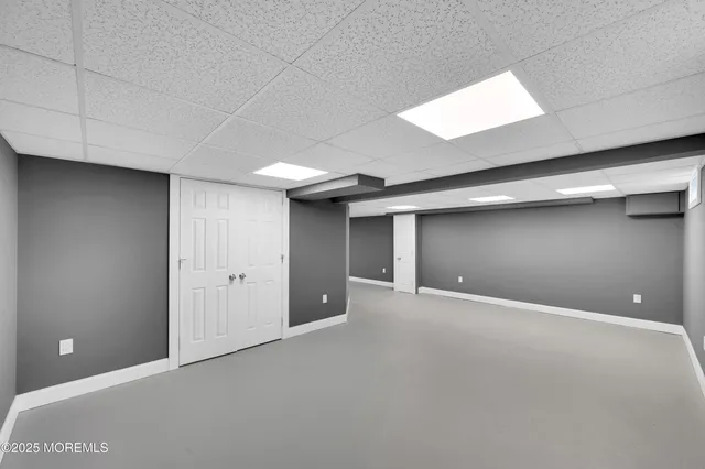 a view of a house with wooden deck