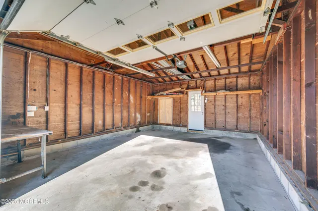 a view of an empty room with stairs