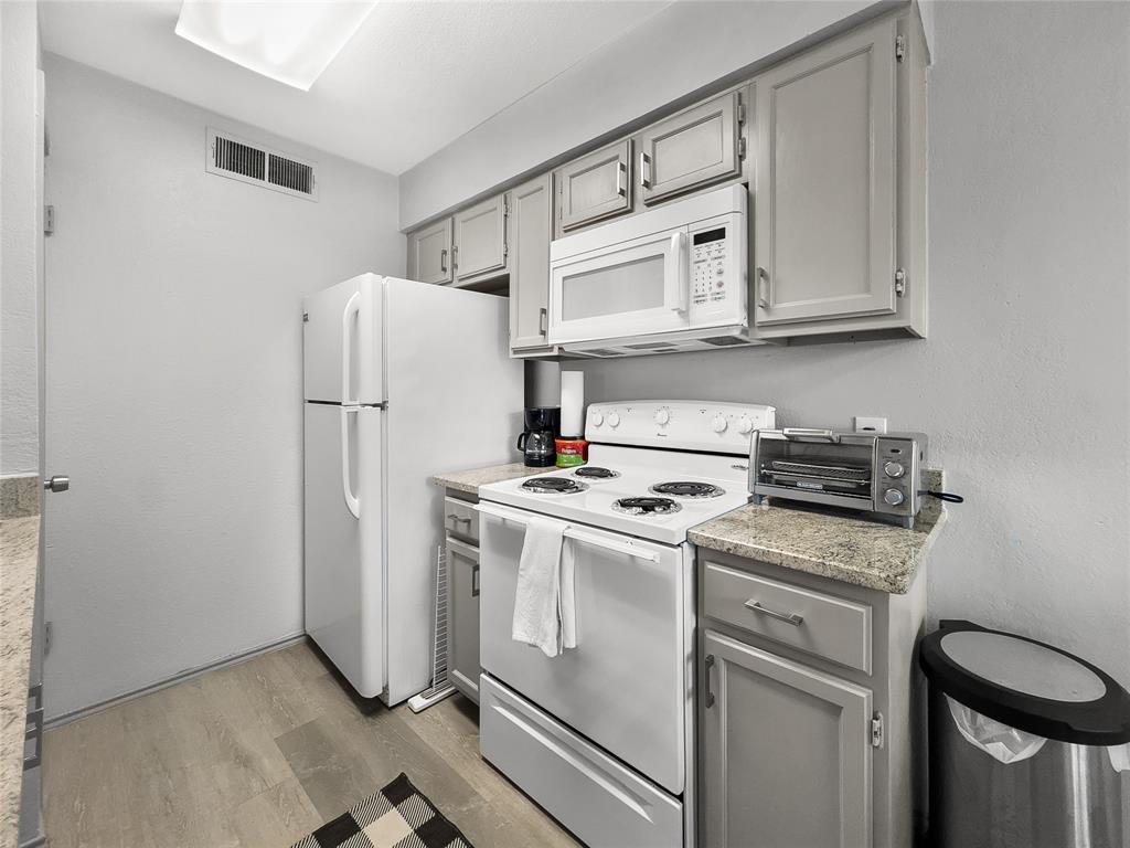 5750 Phoenix Drive, Unit 22 Dallas, TX 75231 - Photo 18 of 30 Kitchen Furnished