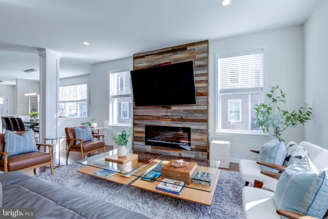 a view of entryway with wooden floor and stairs