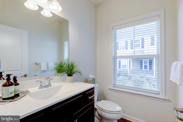 a spacious bathroom with a tub shower and sink