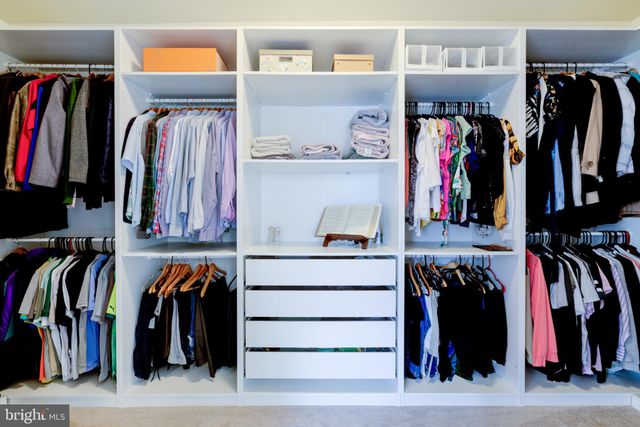 a bedroom with a bed and furniture