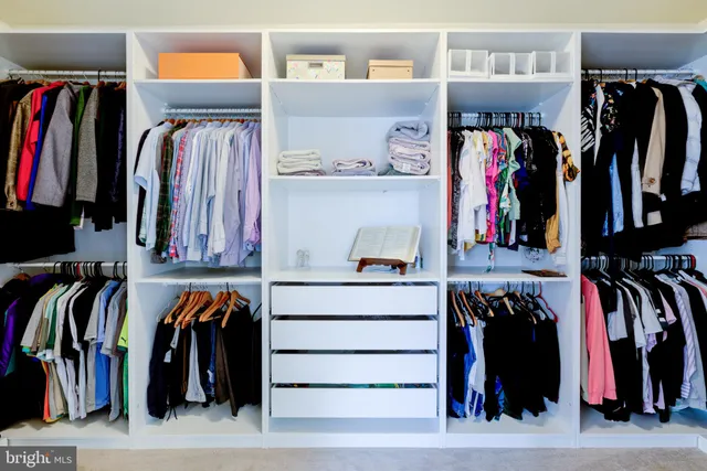 a bedroom with a bed and furniture