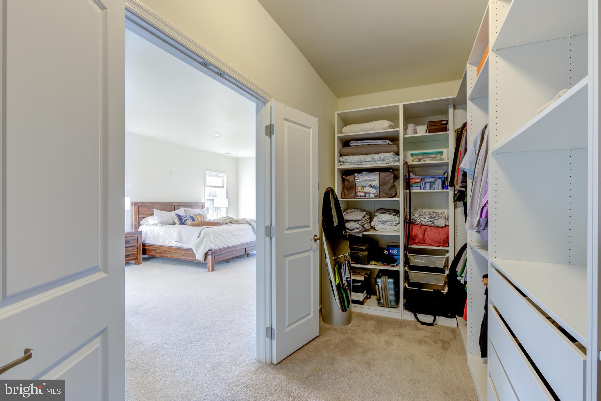 3044 Marias Way Garnet Valley, PA 19060 - Photo 31 of 63 a view of walk in closet with clothes and shoes