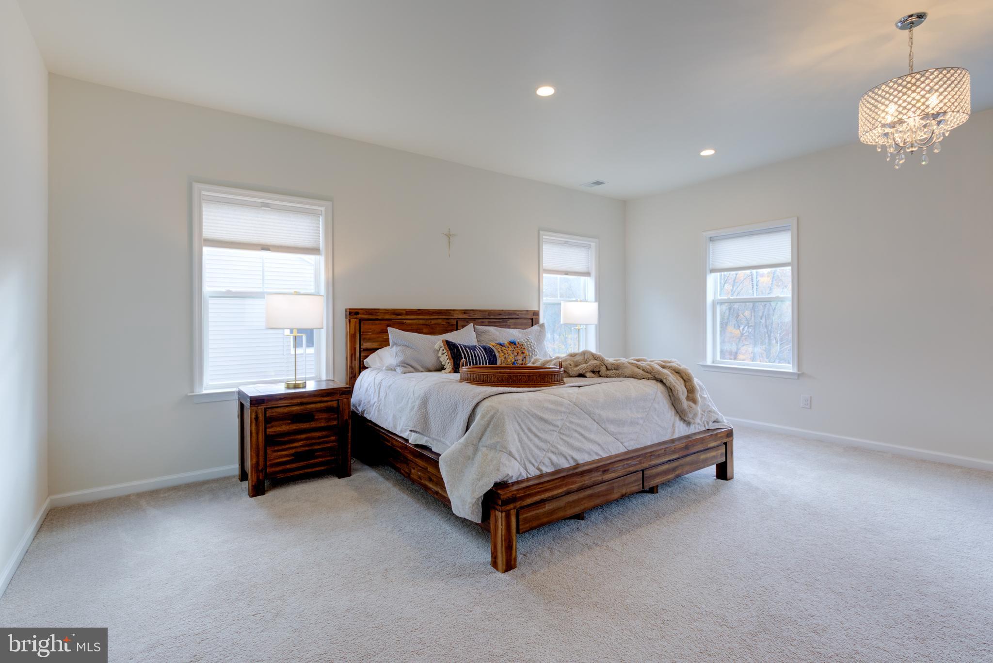3044 Marias Way Garnet Valley, PA 19060 - Photo 33 of 63 a bed sitting in a bedroom next to a window
