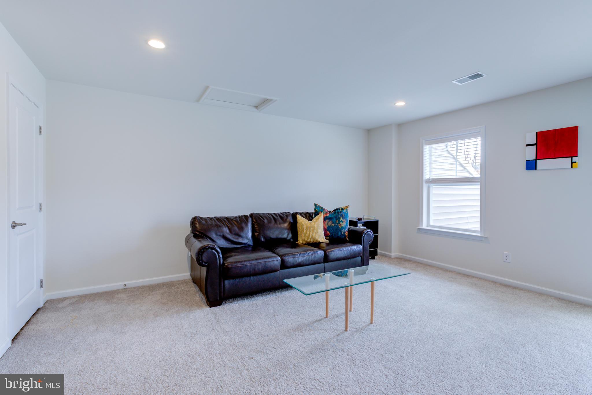 3044 Marias Way Garnet Valley, PA 19060 - Photo 49 of 63 a living room with furniture and a window