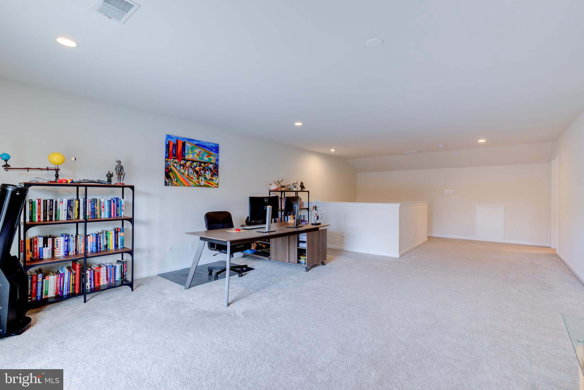 3044 Marias Way Garnet Valley, PA 19060 - Photo 50 of 63 a view of a workspace with furniture and a book room
