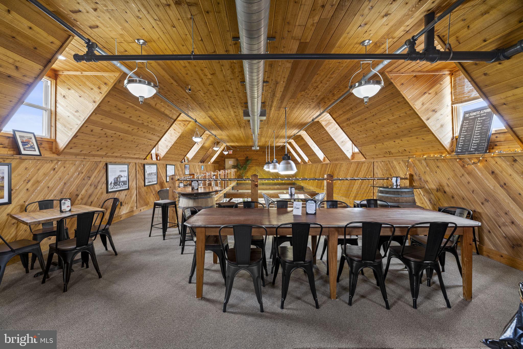6190 Georgetown Road Broad Run, VA 20137 - Photo 80 of 95 Upper guest seating at Vint Hill Craft Winery