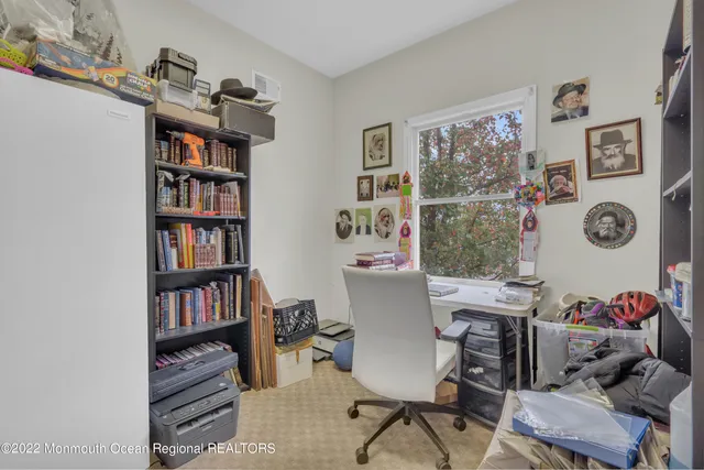 a kitchen with a stove top oven sink and cabinets