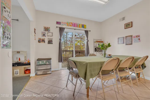 a children room with toys and a couch