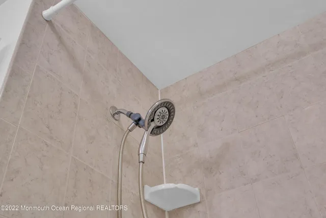 a bathroom with a sink a toilet and a bathtub