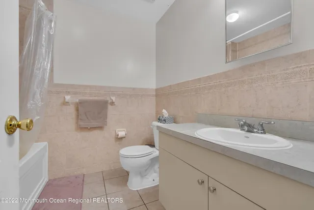 a bed room with a bed and a window