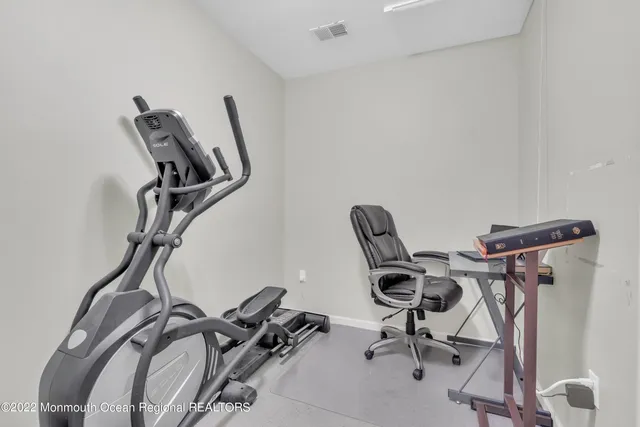 a kitchen with a sink cabinets and window