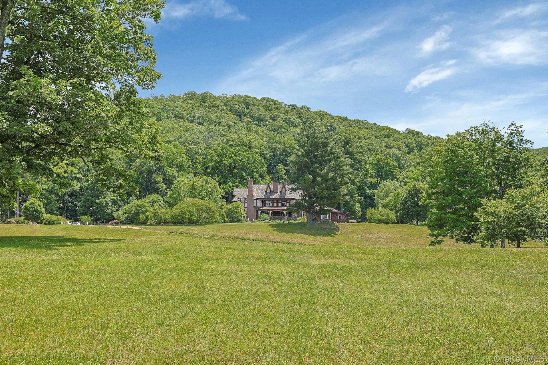 20 Nazareth Way Cold Spring, NY 10516 - Photo 47 of 50 Taken from the driveway, this image captures the expansiveness of the grounds.