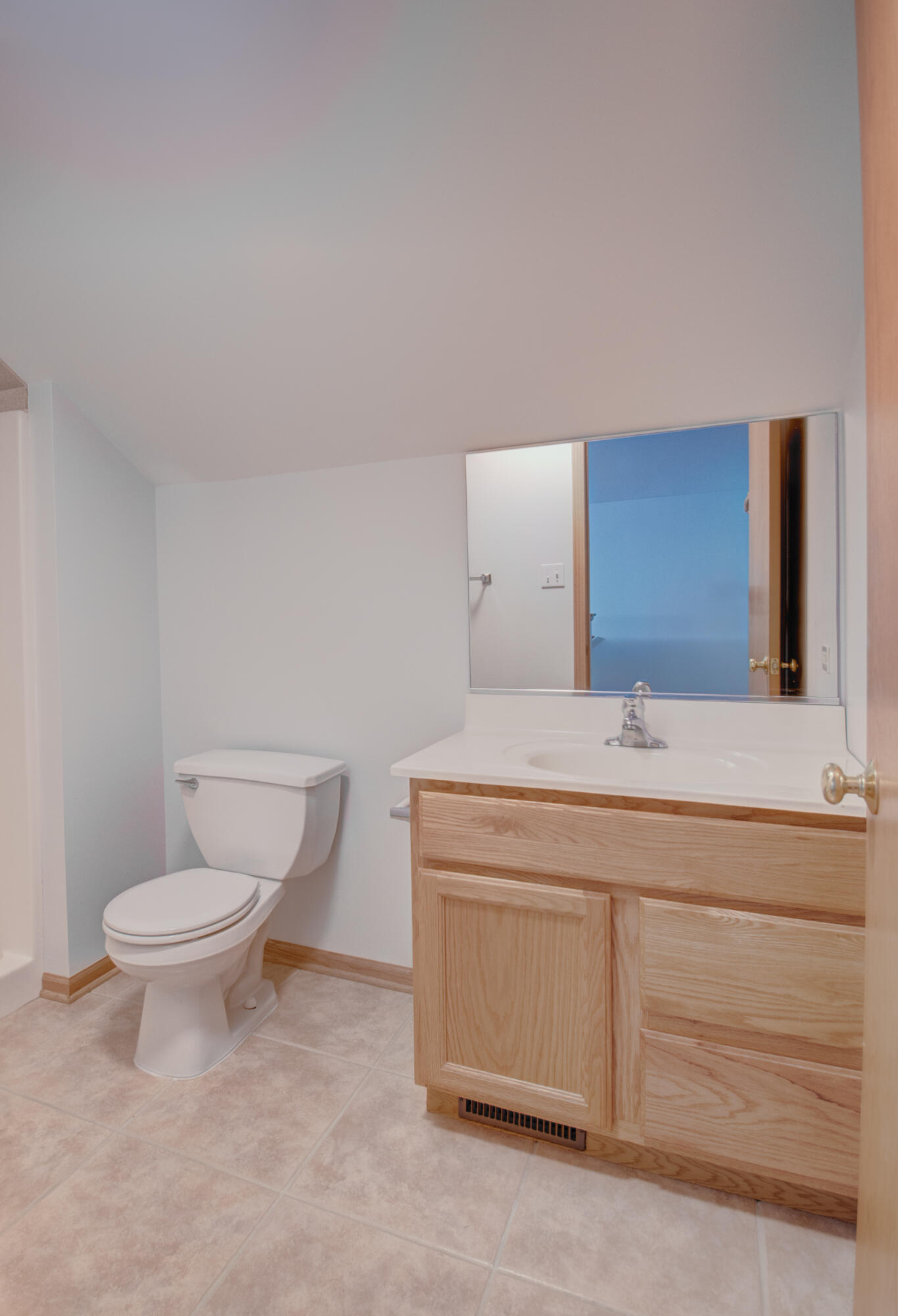 93 West Richton Road Crete, IL 60417 - Photo 29 of 51 a bathroom with a toilet sink and mirror