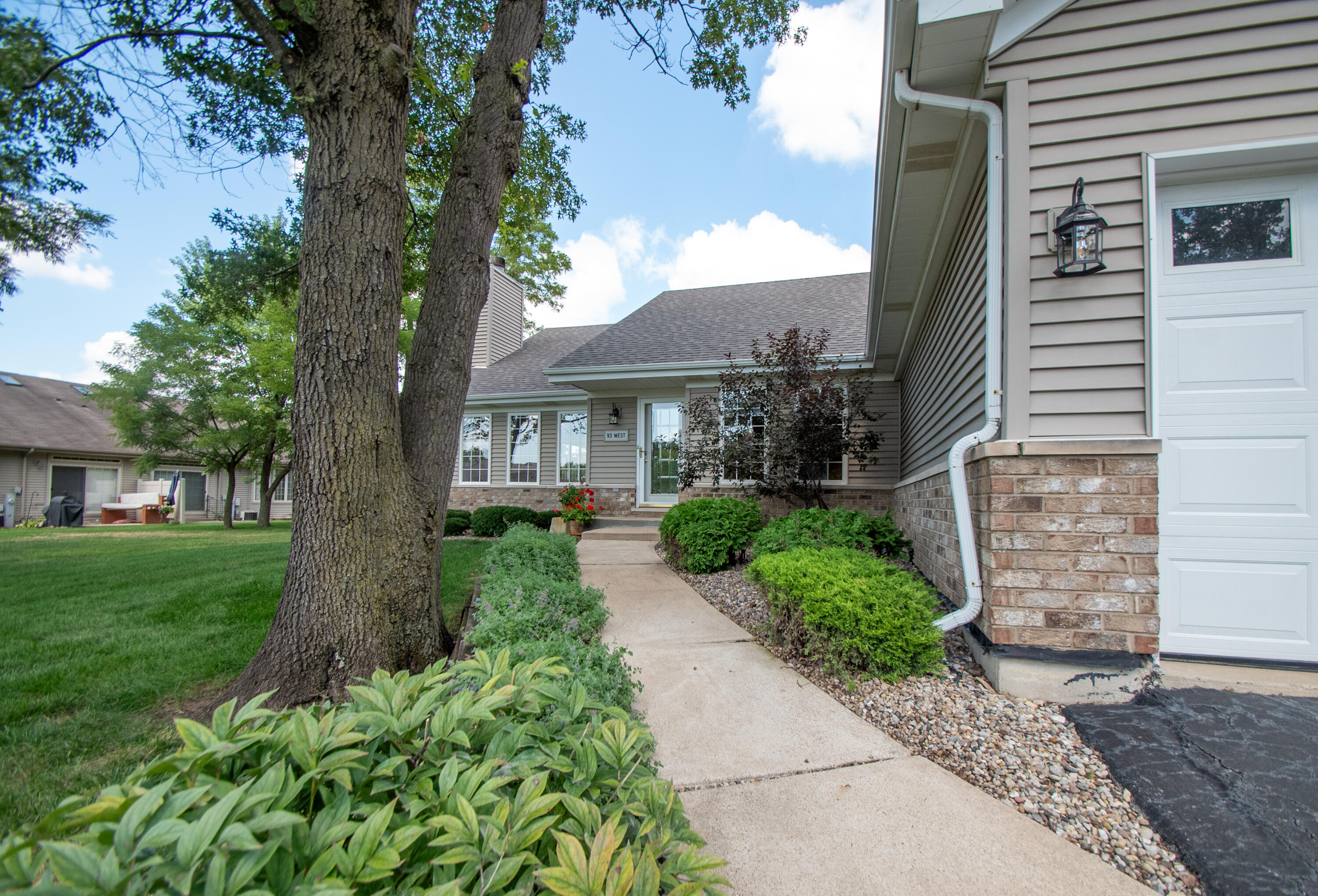 93 West Richton Road Crete, IL 60417 - Photo 42 of 51 a front view of a house with a yard