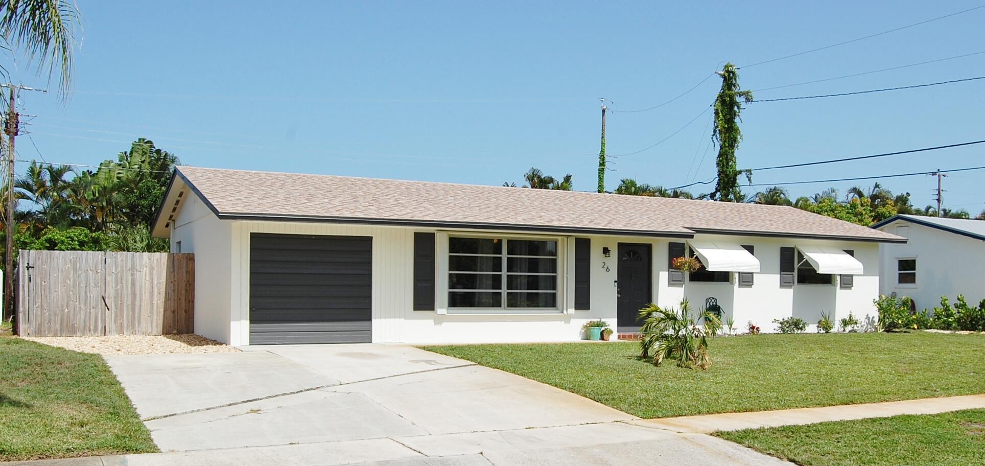 26 Ridgewood Circle Tequesta, FL 33469 - Photo 1 of 24 Front View