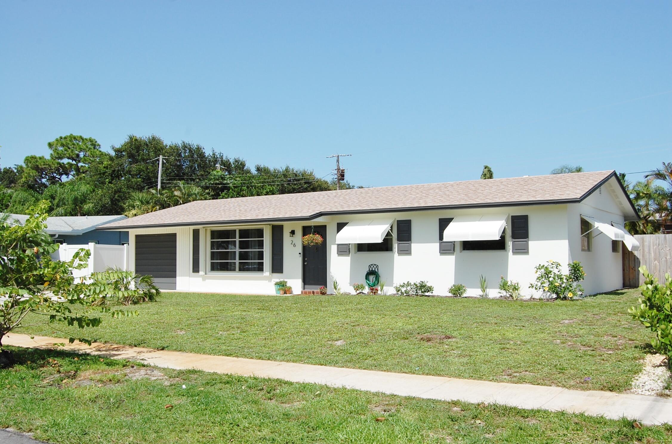 26 Ridgewood Circle Tequesta, FL 33469 - Photo 2 of 24 Front View