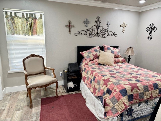59 Private Road Dayton, TX 77535 - Photo 10 of 13 a bedroom with a bed and chair