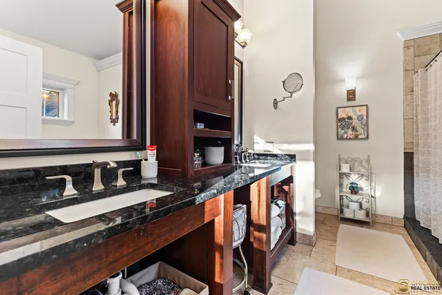 a kitchen with stainless steel appliances granite countertop a stove and a sink