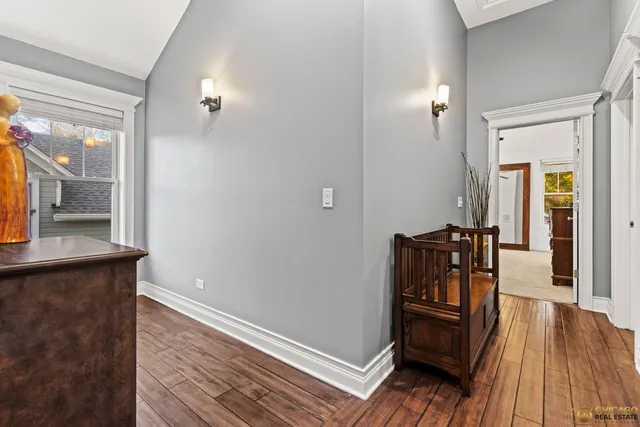 a view of a livingroom with furniture and wooden floor