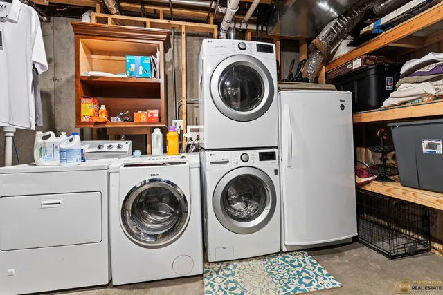 a utility room with dryer and washer