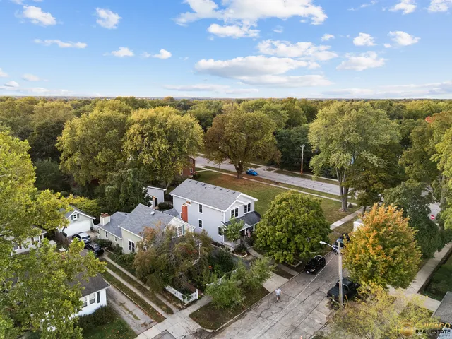 an aerial view of a house with a garden