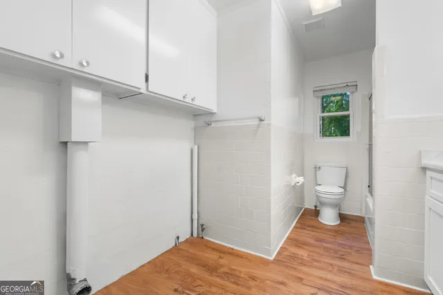 a view of a bathroom with a toilet