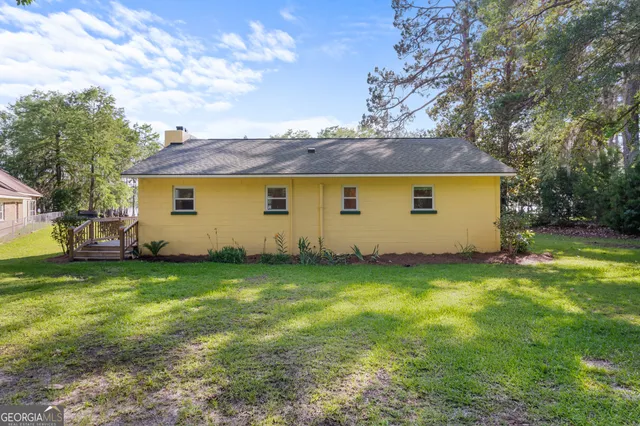 a view of a backyard with a garden