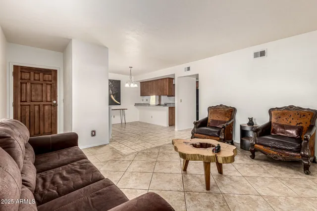 a living room with furniture and a couch