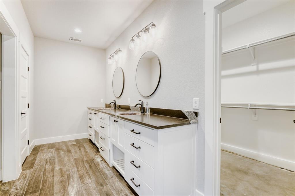 2515 County 141 Road Kaufman, TX 75142 - Photo 17 of 38 Spacious vanities feature beautiful solid surface counters