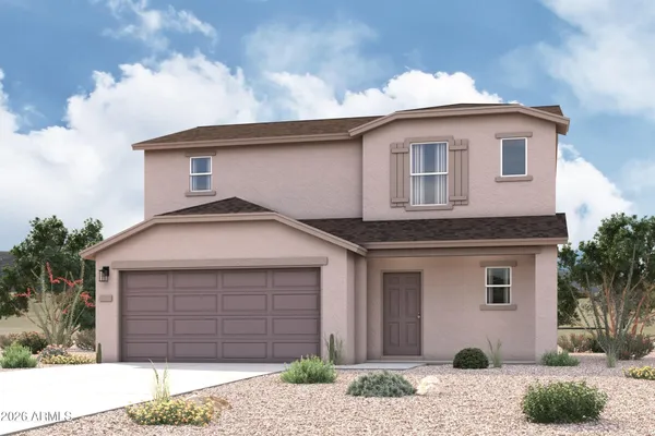 a front view of a house with a garage