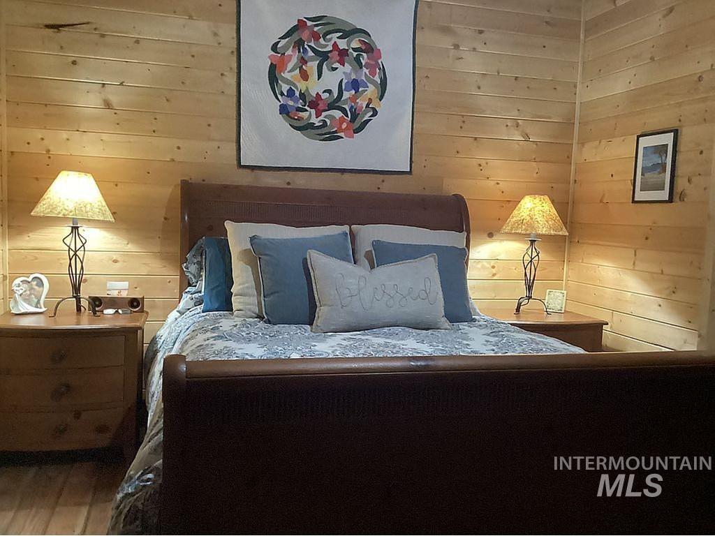 1000 Pardee Road Kamiah, ID 83536 - Photo 23 of 50 Wood-paneled room featuring wood-finish flooring