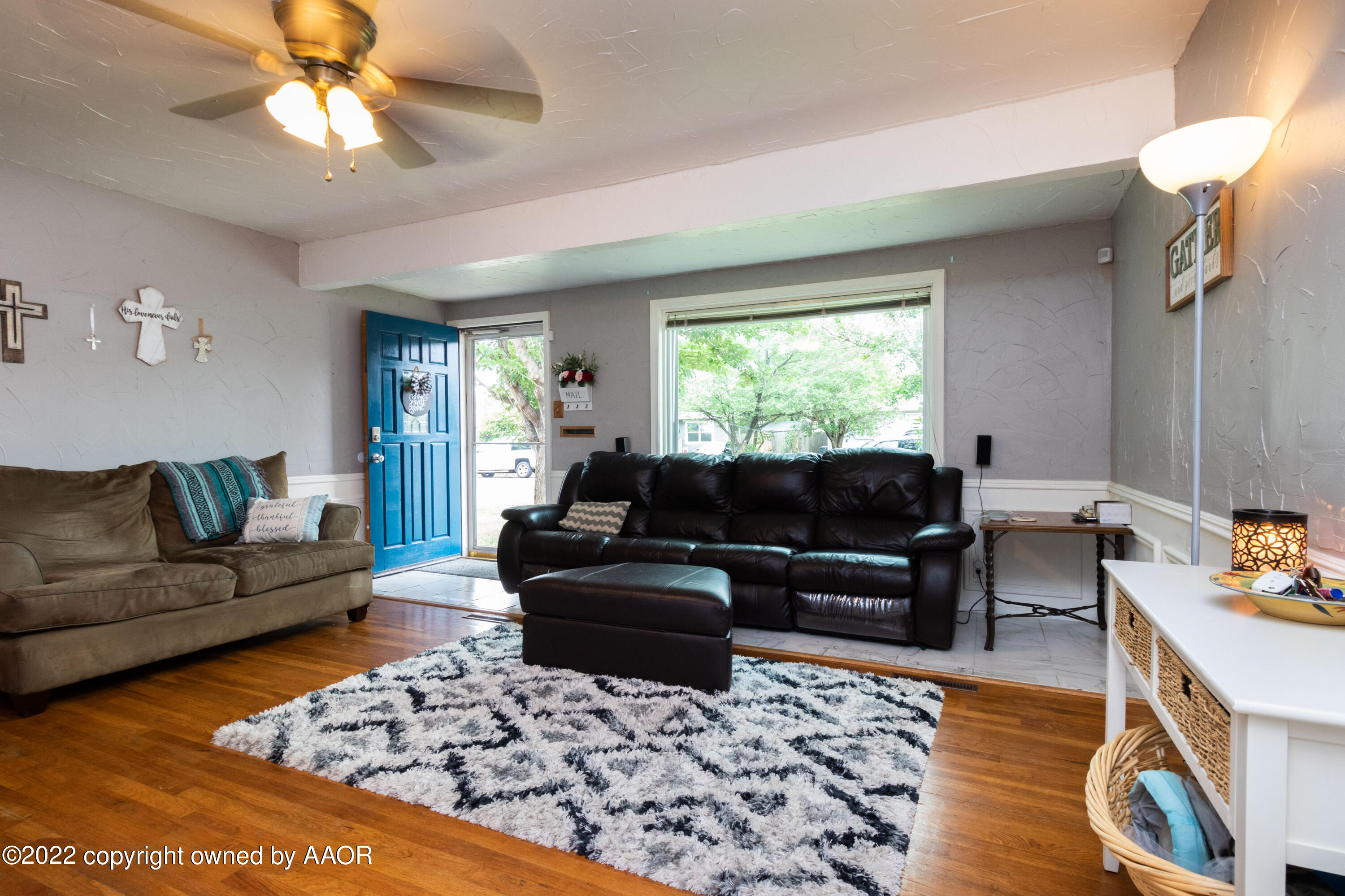 4633 South Hayden Street Amarillo, TX 79110 - Photo 4 of 20 a living room with furniture and a rug