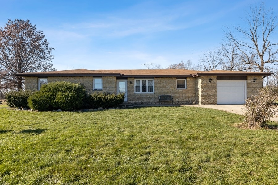 19948 West Mississippi Road Elwood, IL 60421 - Photo 2 of 12 a house view with a garden space