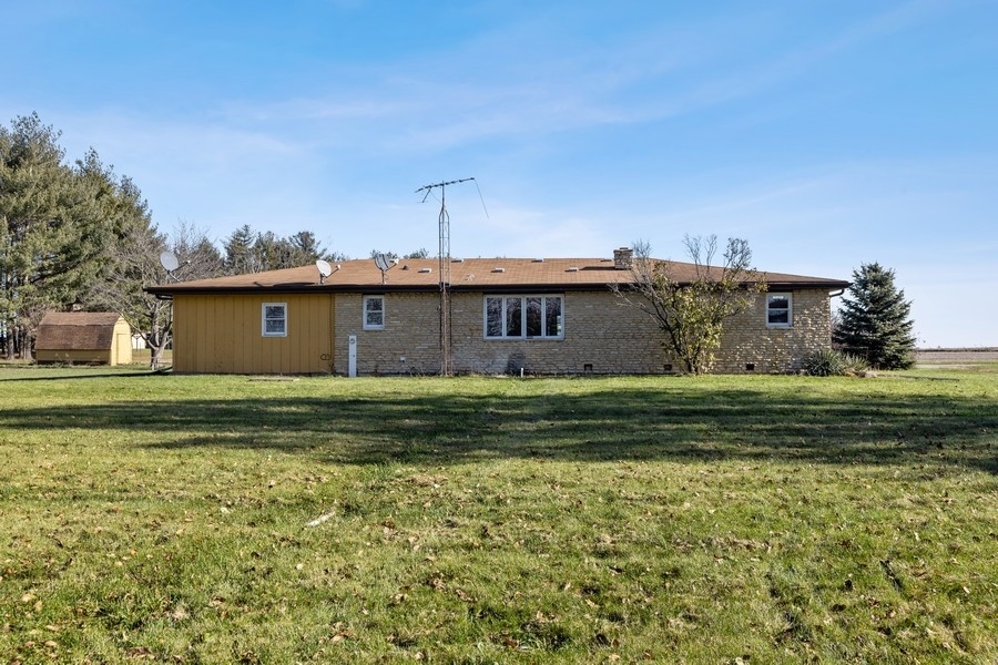 19948 West Mississippi Road Elwood, IL 60421 - Photo 11 of 12 a front view of a house with a garden