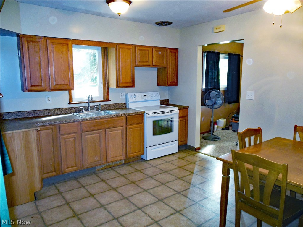 6849 Lake Road Madison, OH 44057 - Photo 7 of 18 Updated Kitchen with stove & freezer