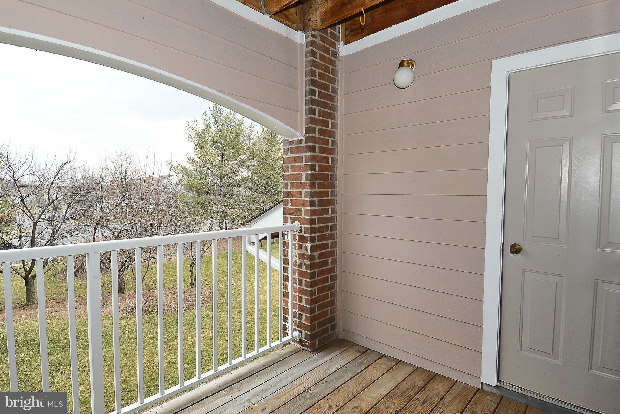 20952 Timber Ridge Terrace, Unit 203 Ashburn, VA 20147 - Photo 15 of 19 Exterior (Rear)