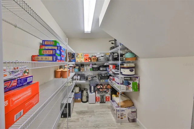 a bathroom with a shower and a sink